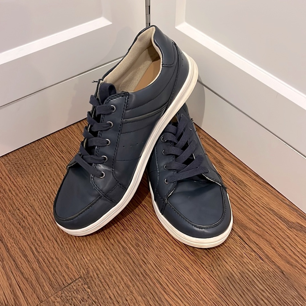 Like new Cat & Jack navy shoes.  Used once for band concert. Size five